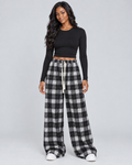 CHECK — Relaxed checked trousers — front view