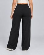 FLOW — Relaxed stretch trousers — back view