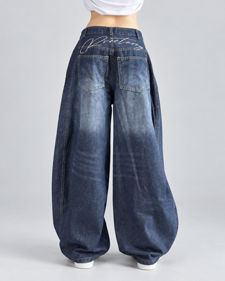 PATCH — Wide-leg panelled jeans — back view