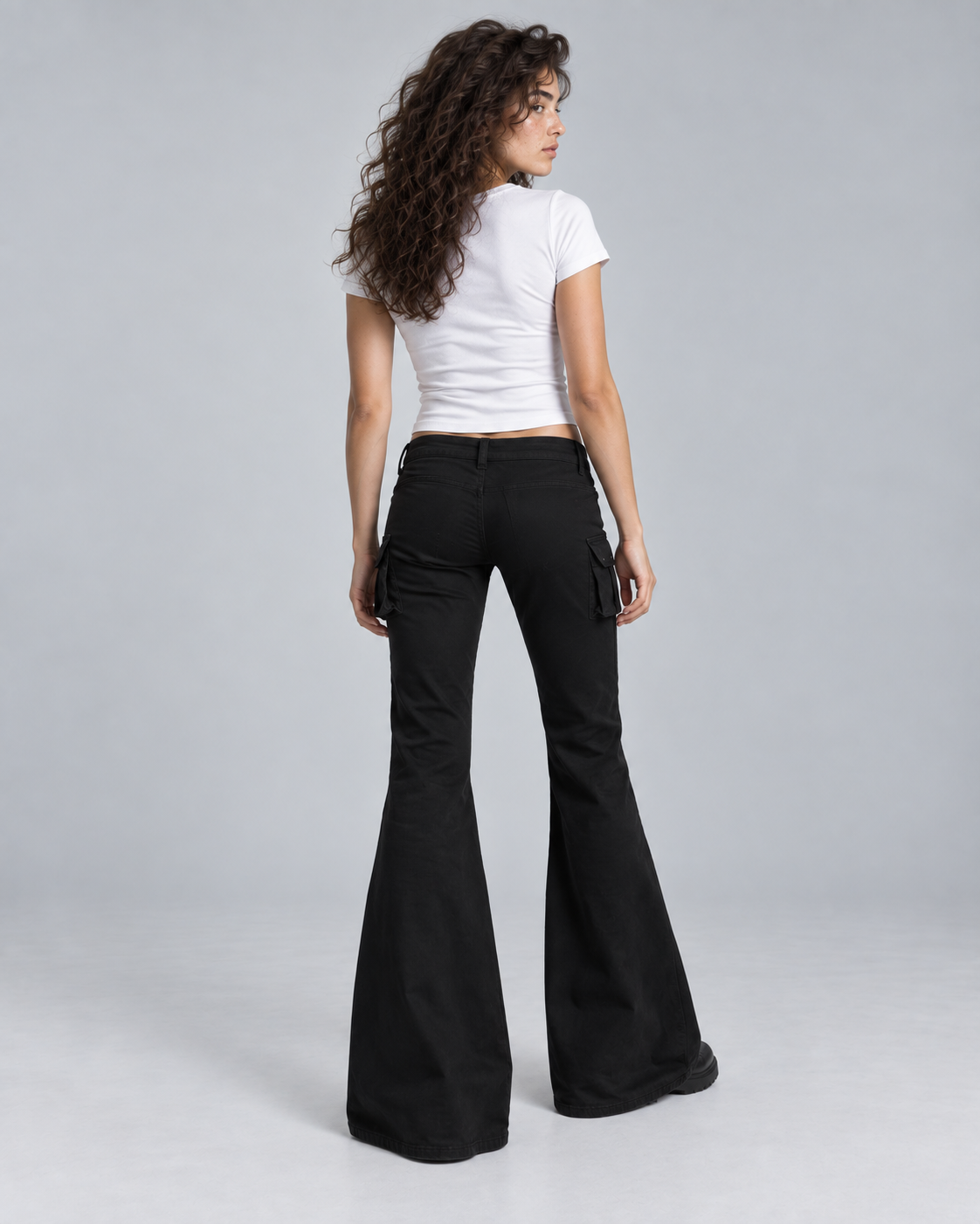 REBEL — Flared trousers with metal details — back view