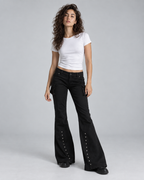 REBEL — Flared trousers with metal details — front view