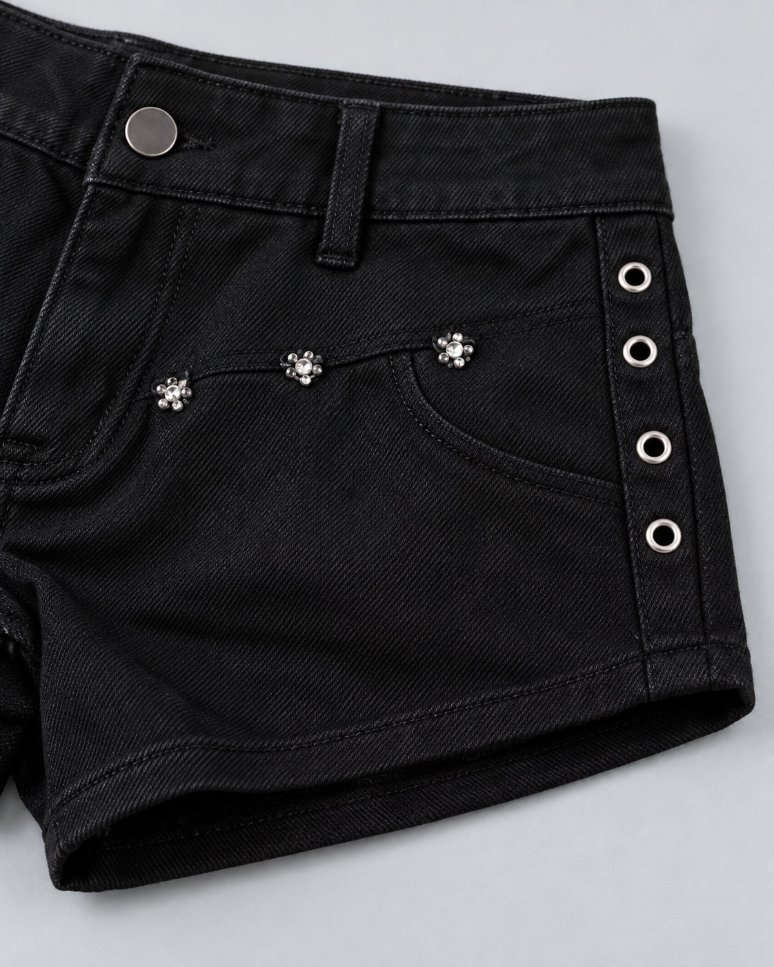 RIVET — Studded denim shorts