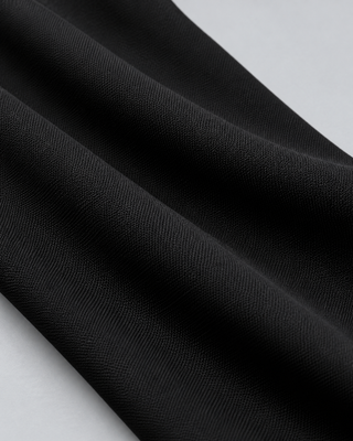 VLINE — Flared pants with crossover waistband