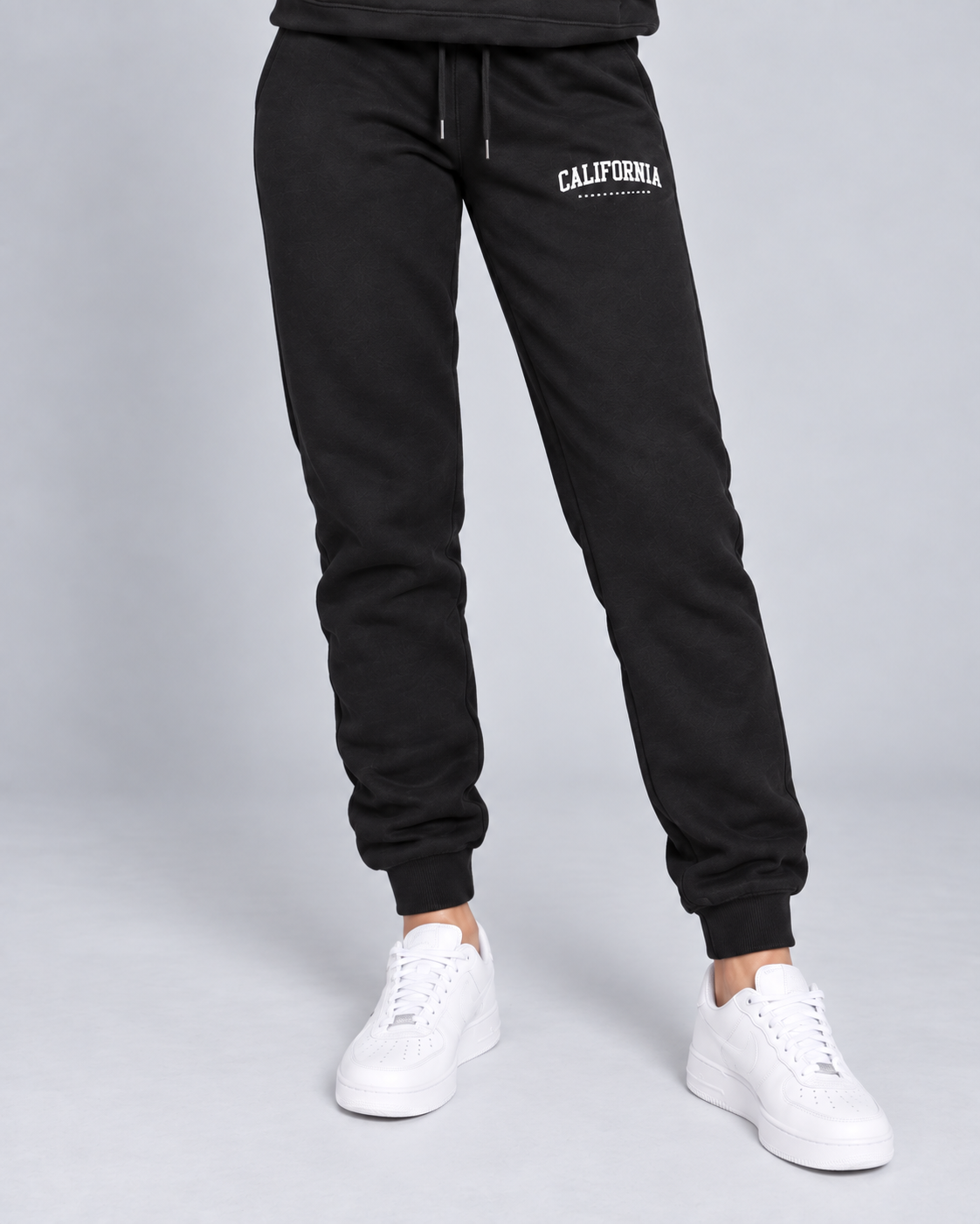 WESTCOAST — Trousers with stripe details