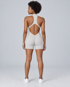 ZENITH — Zip-front open-back sports romper — back view
