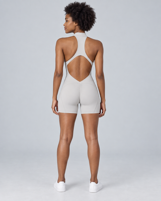 ZENITH — Zip-front open-back sports romper — back view