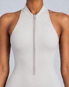 ZENITH — Zip-front open-back sports romper